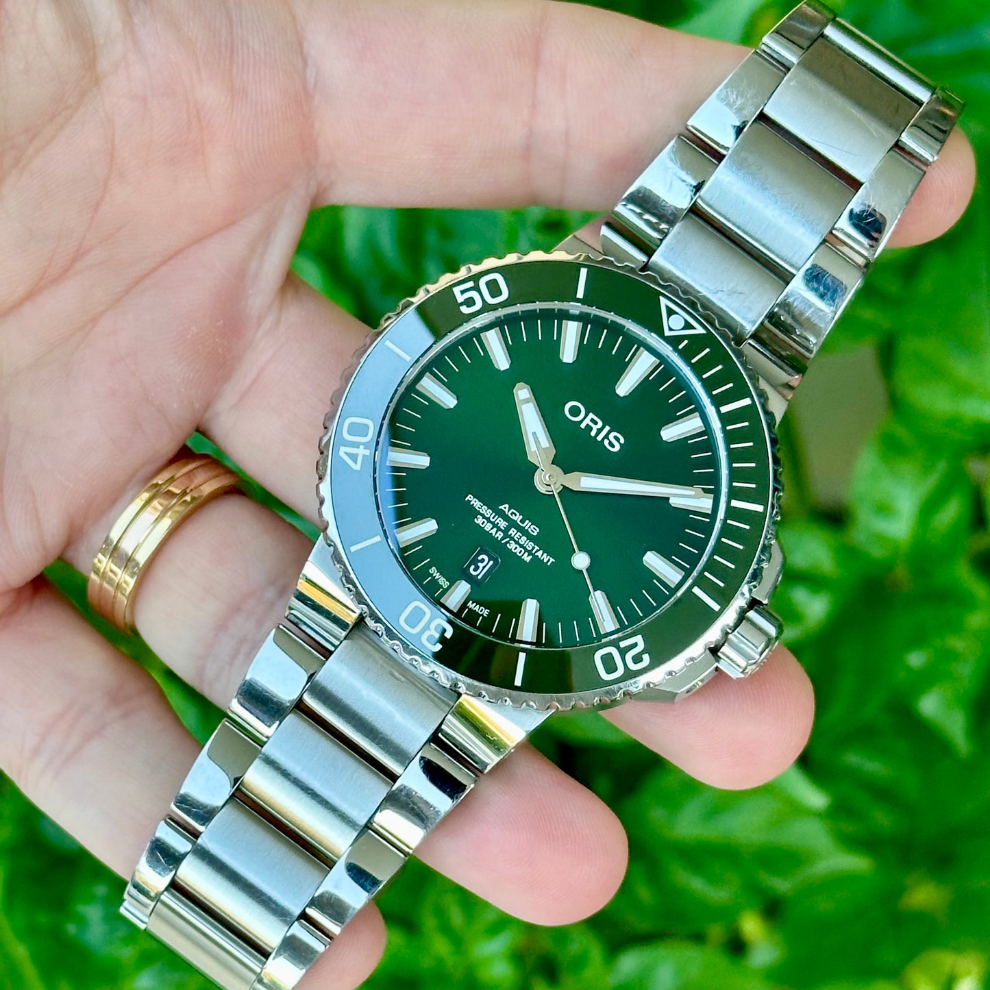 Aquis Sunburst Green Dial 2019